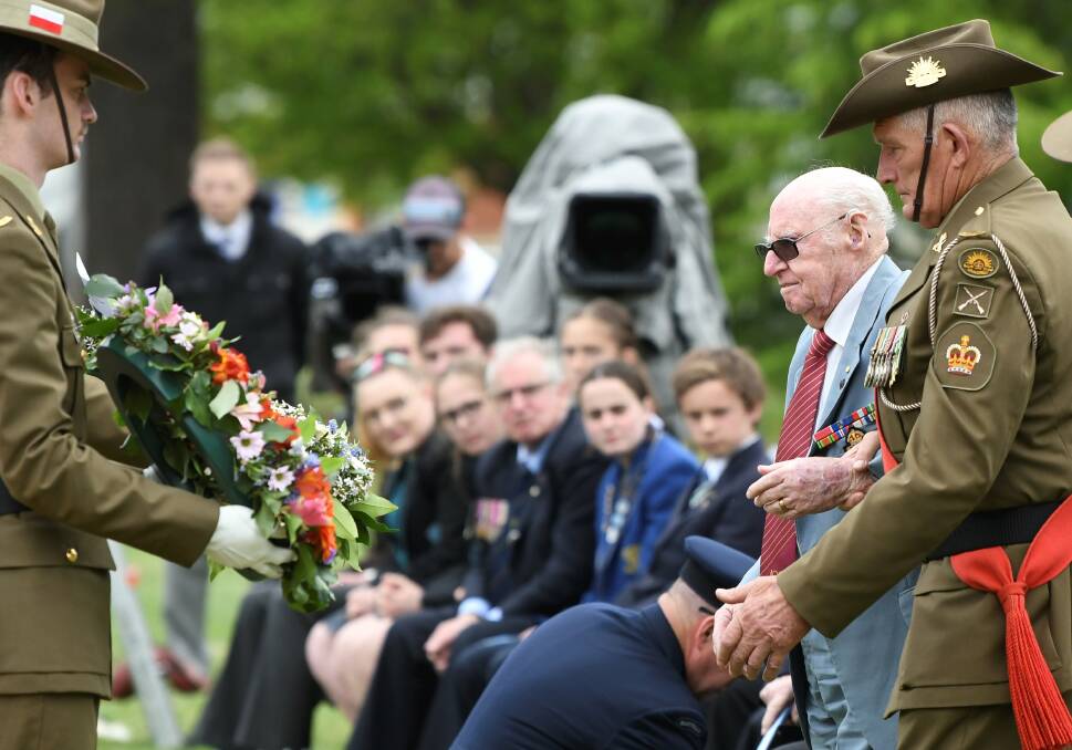 Former prisoner of war Norman Anderton prepares to lay a wreath at the memorial for the Thai-Burma railway. Picture: Lachlan Bence
