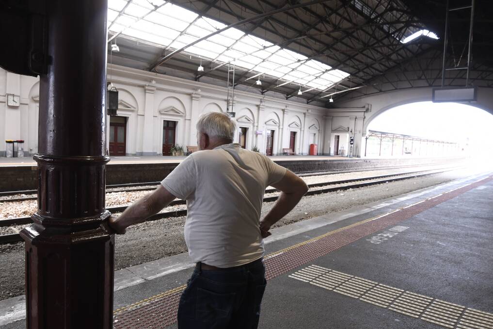 Long wait: A man at Ballarat train station in March. Picture: Lachlan Bence