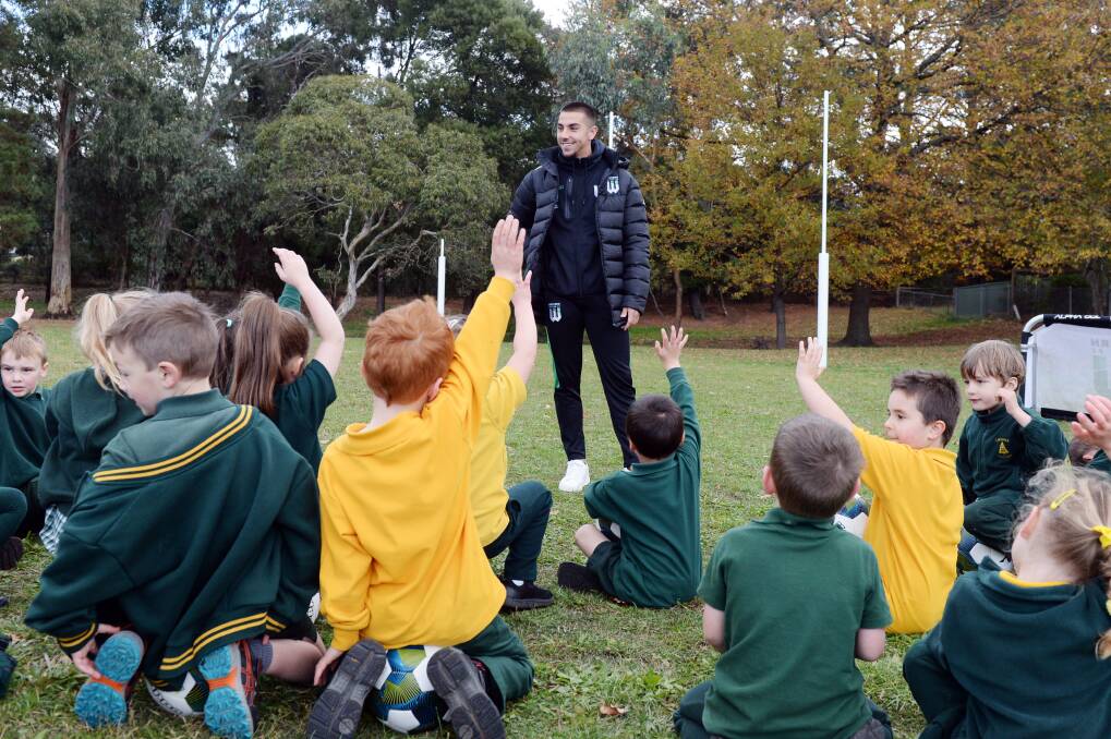 Western United's Dalibor Markovic runs a clinic at Creswick Primary School. Pictures: Kate Healy