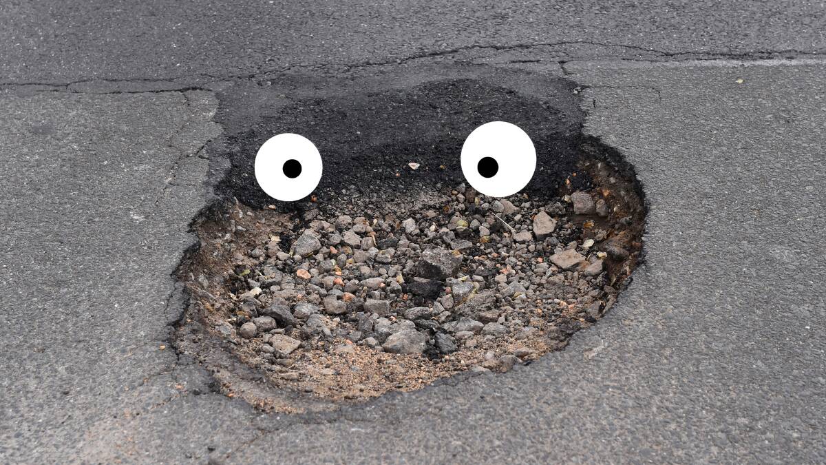 A pothole on Dana Street last year. File photo