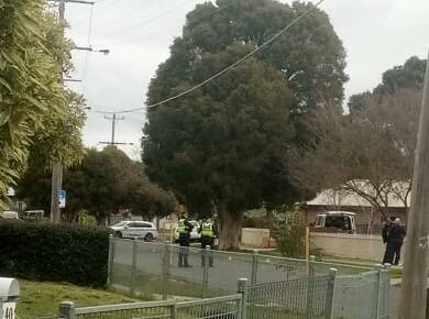 Police on the scene on Marigold Street this afternoon. Picture: contributed