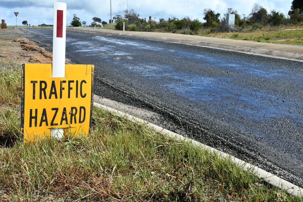 A traffic hazard sign at the Rokewood-Skipton Road intersection of the Lismore-Scarsdale Road.