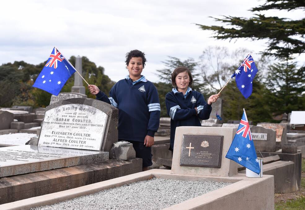 Respect: Nate and Cerey from Macarthur Street Primary School at the Ballarat New Cemetery. Picture: Adam Trafford