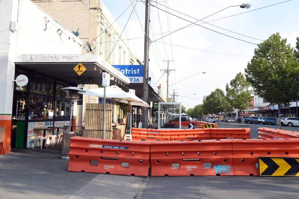 Shut down: Armstrong Street's Pancho was forced to remove its on-street dining tables, and the trial dining hubs have also been taken down. Picture: Kate Healy