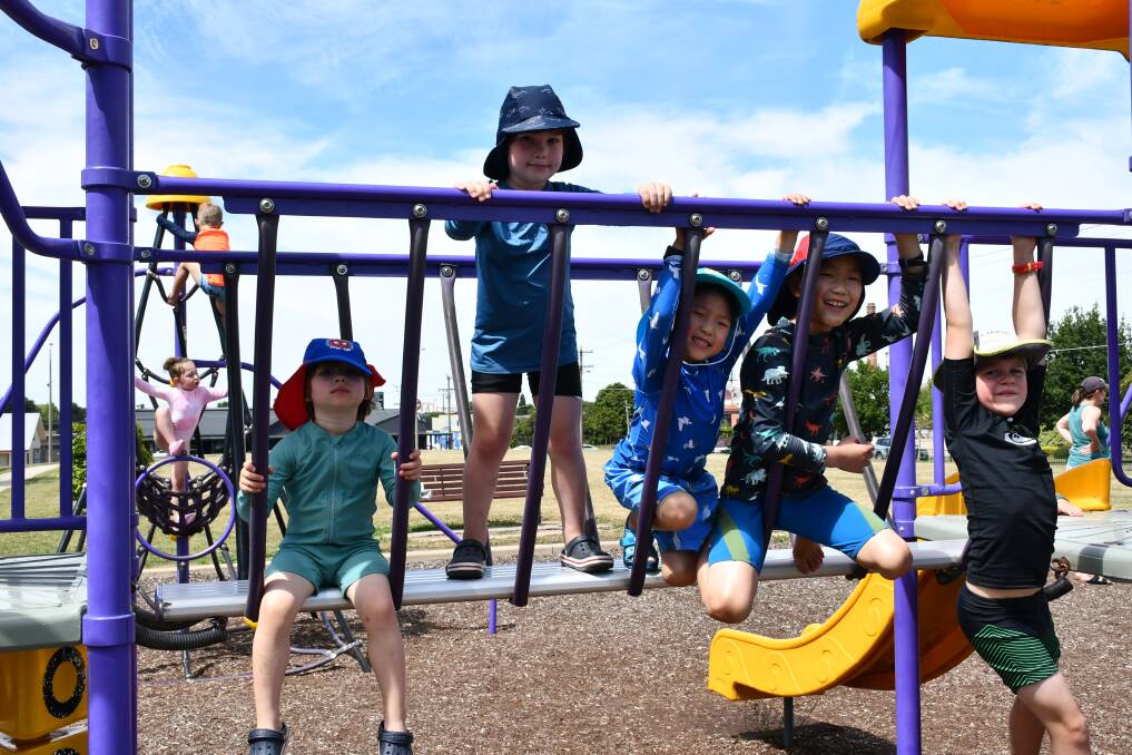 Hanging out: Reuben, Austin, Toby, Jayden, and William at the park's playground.