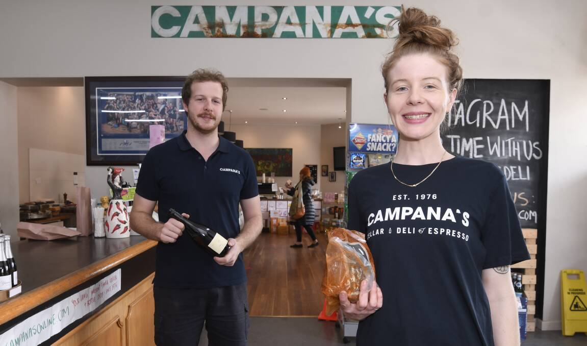 Still here: Siblings Lou and Meg Campana are pushing the family business through the crisis with a new online store and delivery service. Picture: Lachlan Bence