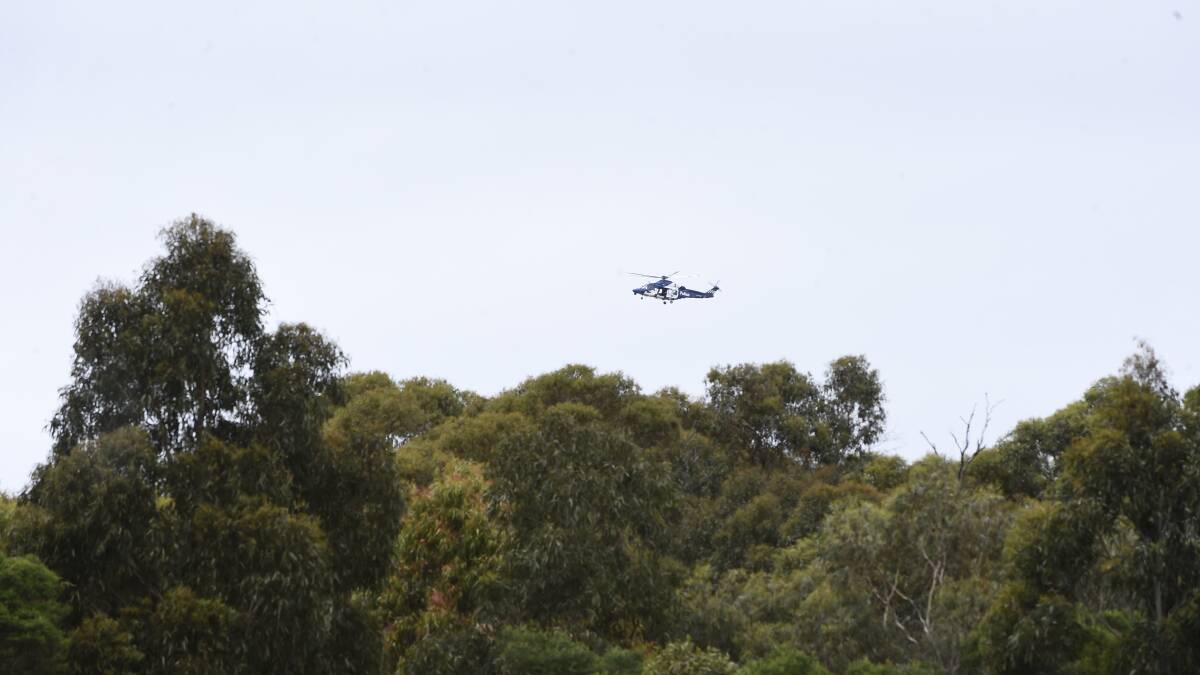 A police helicopter south of Buninyong. Picture by Adam Trafford