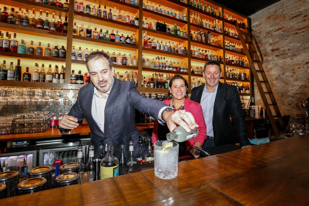 State Tourism Minister Martin Pakula finishes off a gin and tonic with Wendouree MP Juliana Addison and venue owner Brian Taylor at Roy Hammond on Friday. Picture: Luke Hemer