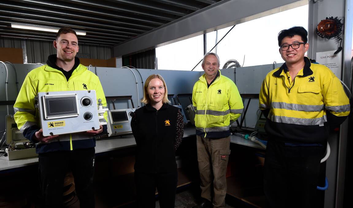 Next phase: Gekko's project manager Scott Baker, marketing and communications officer Marleen Gort, design engineer Michael Trenorden, and automation engineer Travis Lim with the new prototype GeVentor. Picture: Adam Trafford