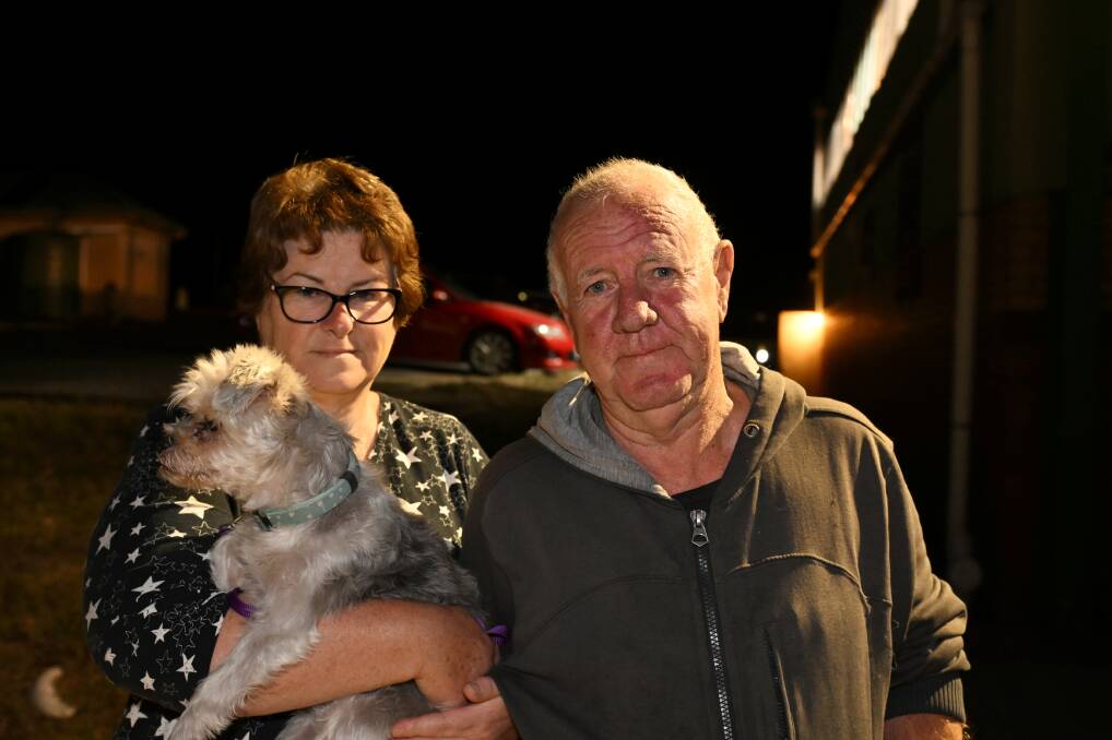 Steve and Mary from Smythesdale with Annie at the Haddon relief centre on Tuesday night. Picture by Lachlan Bence