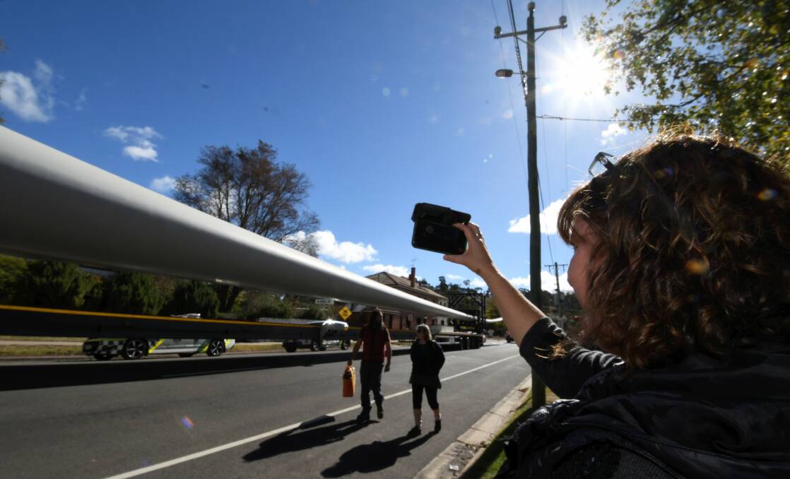 Snap: Kerry Grant takes a photo of the blade, parked on Lawrence Street.