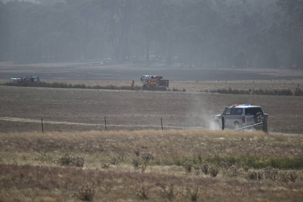 Firefighters on the control line near Beaufort. Picture by Lachlan Bence