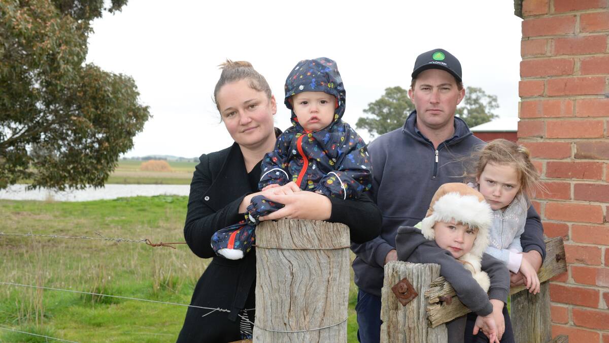 Katherine and Ben Myers, with kids Angus, Tommy, and Charlotte, on their property in Tourello. Picture: Kate Healy