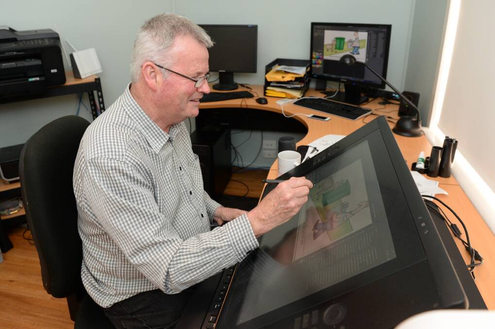 John Ditchburn at work on a cartoon for The Courier. File photo