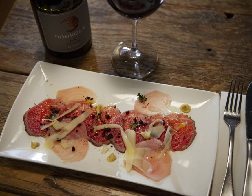 Carpaccio of eye of round, organic heirloom beets, Moonambel olive oil and olive crumb, mustard, thyme, Goldfields Farmhouse 'St George' cheese, with 2018 Dogrock Grenache