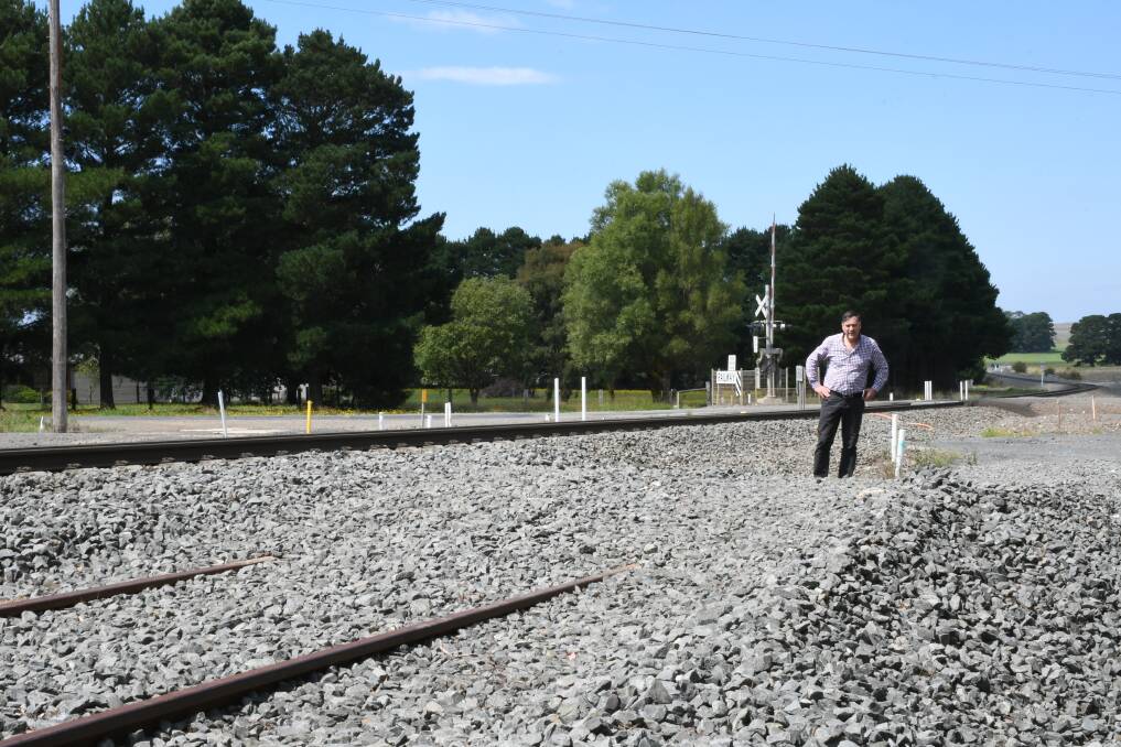 When?: Rail advocate Nick Beale stands in front of unfinished tracks near Ballan in February.