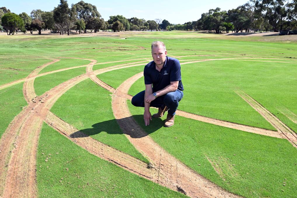 Midlands Ballarat general manager Cam Vallance on the damaged green. Picture by Kate Healy