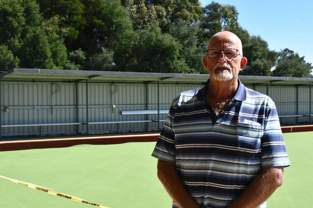 Waiting to roll: Creswick Bowling Club chair Gerry Flapper at the damaged green. Picture: The Courier