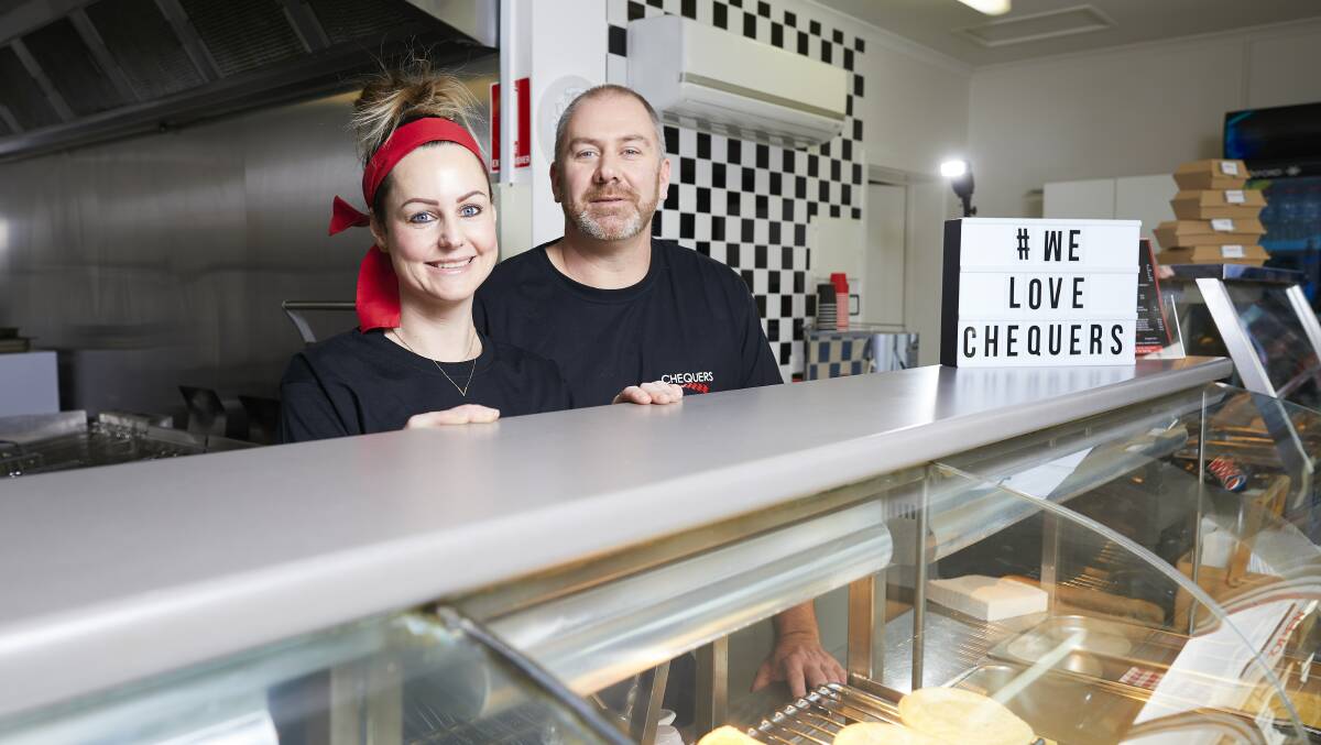 Chequers owners Angela and Shane Finch have opened up a second store on Creswick road to serve fans at dinner time. Picture: Luka Kauzlaric