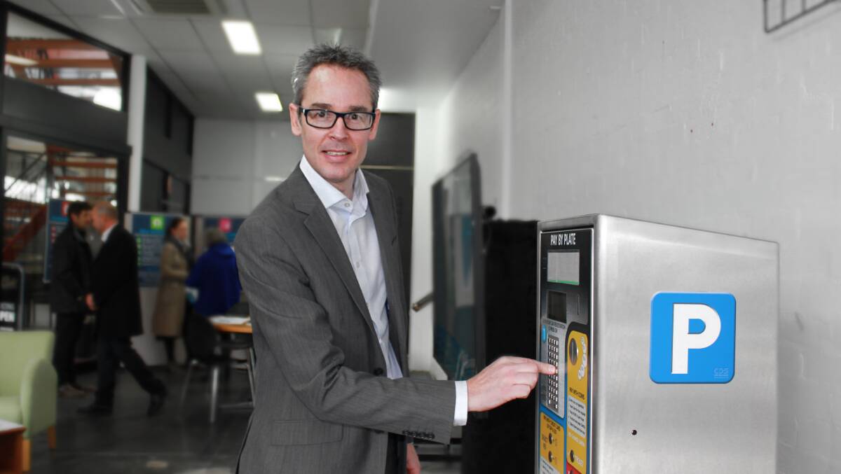 New option: Councillor Ben Taylor tests out a new parking meter with number plate input options and 'tap and go' card capability at the Parking Plan pop up shop on Sturt Street. Consultation on City of Ballarat's plan started on Monday. Picture: Ashleigh McMillan
