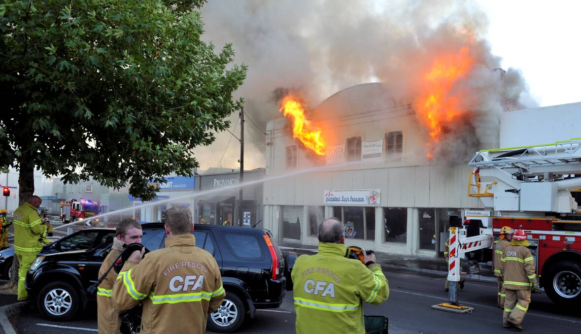 Fire: The Plaster Funhouse building was engulfed by flames in February 2014, and later demolished. Picture: Lachlan Bence