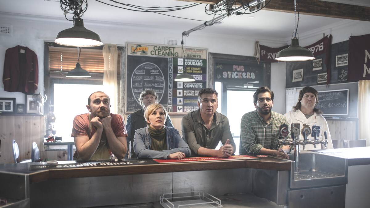 Footy fanatics: The cast of new Australian film 'The Merger', including writer and actor Damian Callinan (third from right) and Ballarat comedian Aaron 'Gocsy' Gocs (far right). It will launch in Ballarat on September 6. 