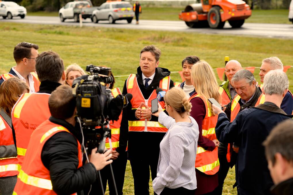 The media pack surrounds Roads and Road Safety Minister Luke Donnellan. Picture: Supplied