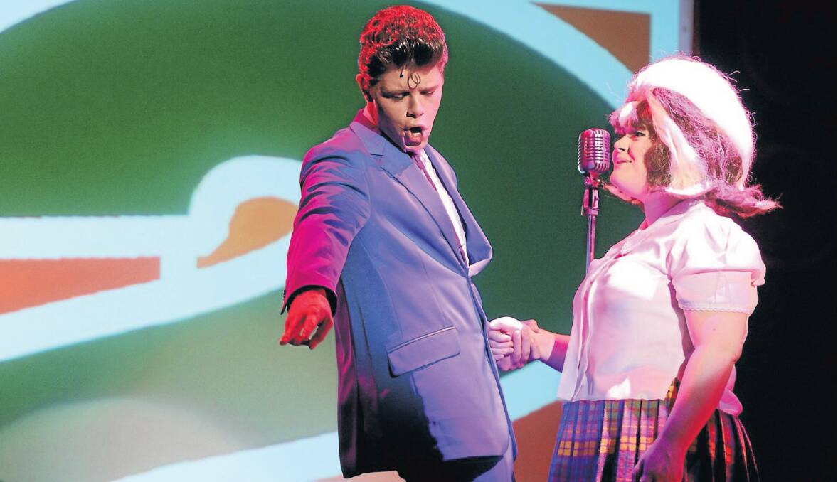 (FAR LEFT) Ladies Choice: Jacobsson in 2012 as Link Larkin in 'Hairspray', with Abby Grace. Picture: Justin Whitelock