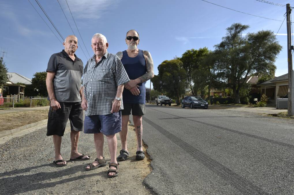 Graeme Henderson, Barry Tuddenham and Henry Svedas are angry about the state of their road in Spencer St, Sebastopol. Picture: Adam Trafford