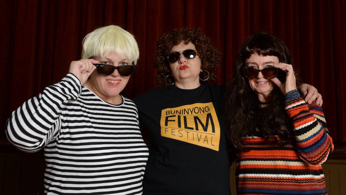 Night fever: Buninyong Film Festival organisers Lisa Cressey, Niki Kostos and Joan Goldsmith get funky in honour of the Studio 54 documentary which will be shown on Friday night at the Buninyong Town Hall. Patrons can dress up in 70s clothes and enjoy a cocktail. Picture: Kate Healy
