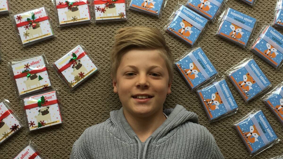Festive: Jake Sbardella is selling more than 400 happiness advent calendars in the lead-up to Christmas to raise funds for Ballarat's homeless population. 