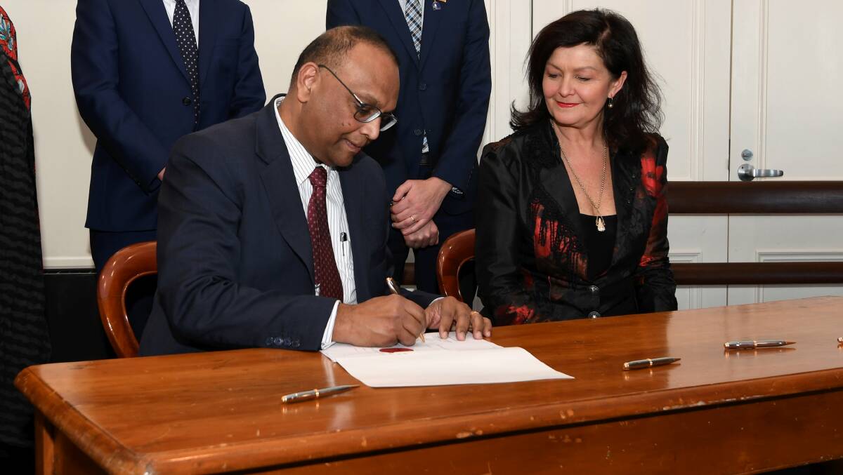 MRCB CEO Ravi Kirshnan with Ballarat mayor Samantha McIntosh signing the Heads of Agreement. Picture: Lachlan Bence