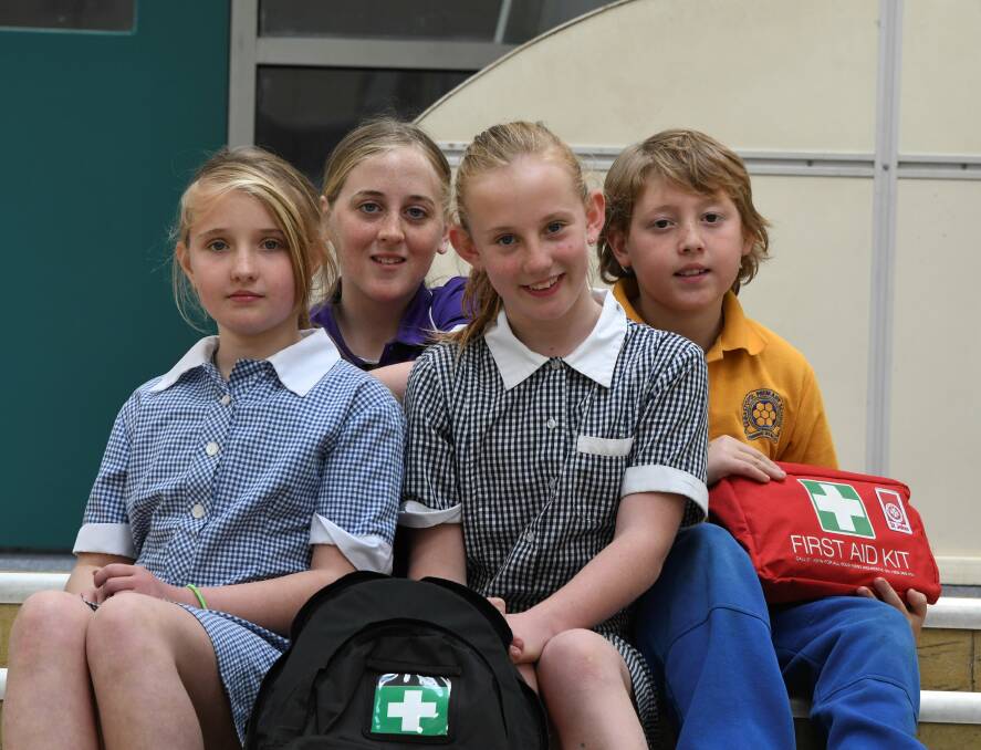 Helping hands: Sebastopol Primary School year 5 and 6 pupils Hayley, Stephanie, Lillian and Connor helped an elderly Sebastopol woman who had fallen in her backyard on Wednesday. Picture: Lachlan Bence