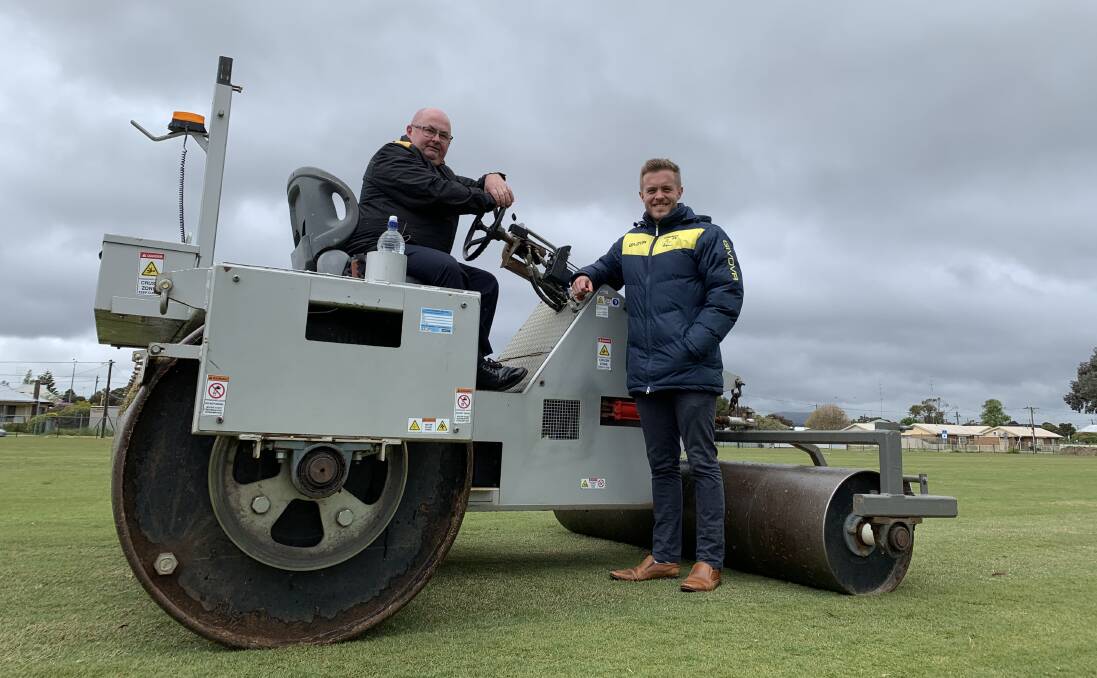 Steaming ahead: City of Ballarat councillor Des Hudson and Vikings Football Club committee member Sam Young say the new turf at St George's Reserve is on a roll.