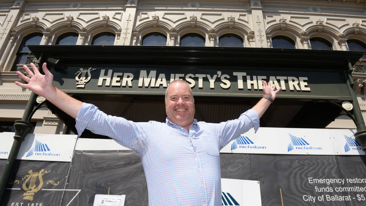 Elation: Royal South Street Society chief executive officer Brett Macdonald shows his excitement outside Her Majesty's Theatre on Tuesday. Picture: Kate Healy