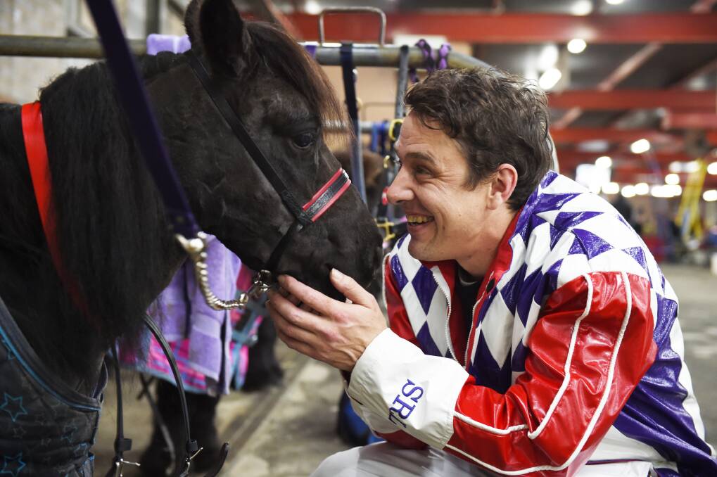 On the trot: Love Your Sister ambassador Samuel Johnson gets up close and personal with pony Miles at the 2018 Girls Night Out. Picture: Kate Healy