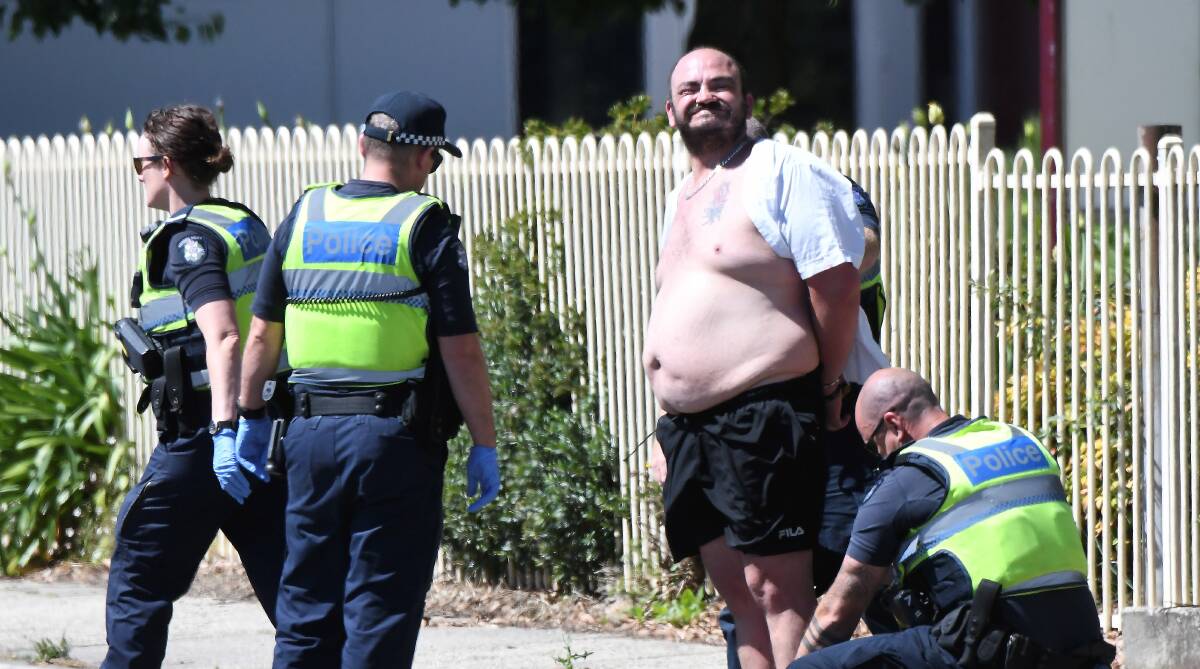 Court: Police arrest Matthew Den Ouden outside Wendouree Primary School in School Lane on Boxing Day. He was refused bail at the Ballarat Magistrates Court on Thursday. Picture: Lachlan Bence