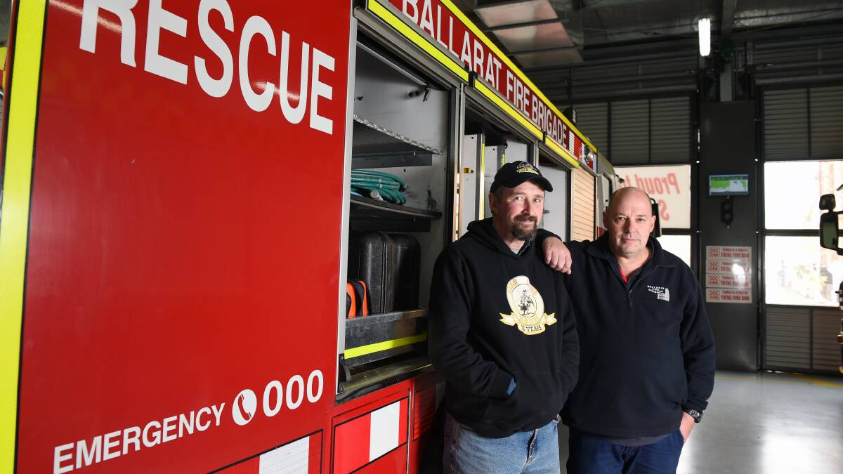 Close bond: Sebastopol CFA volunteer Bill Cook with Ballarat Fire Brigade captain Mark Cartledge, who helped coordinate his rescue from a crash in 2016. Picture: Kate Healy