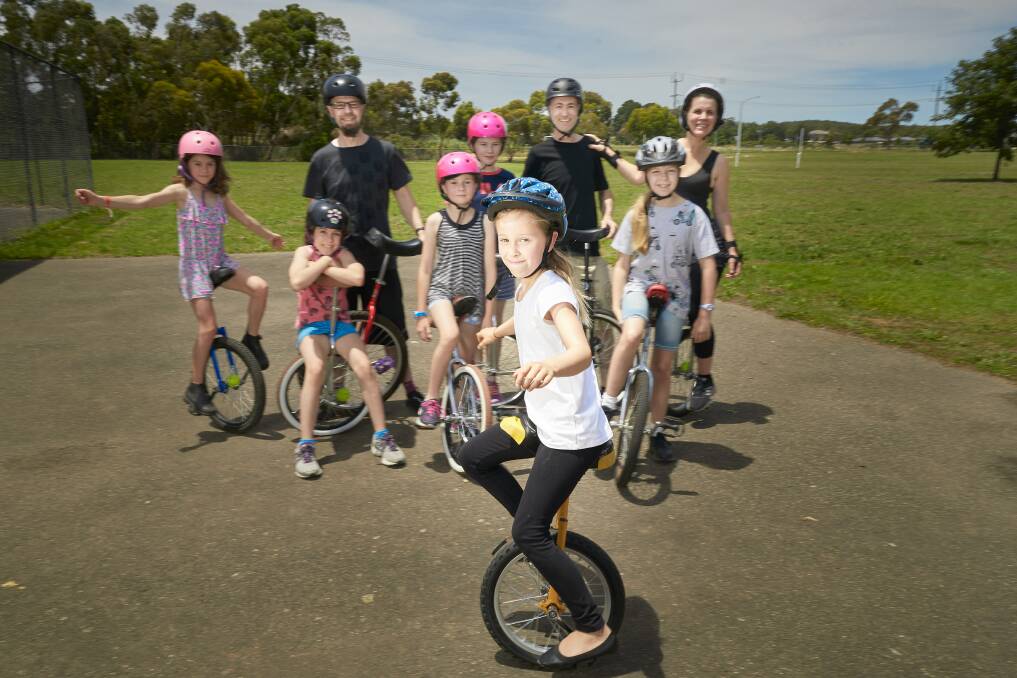 Wheely good: Sophie Arnott, 8, and members of the Ballarat Unicycle Club. Picture: Luka Kauzlaric