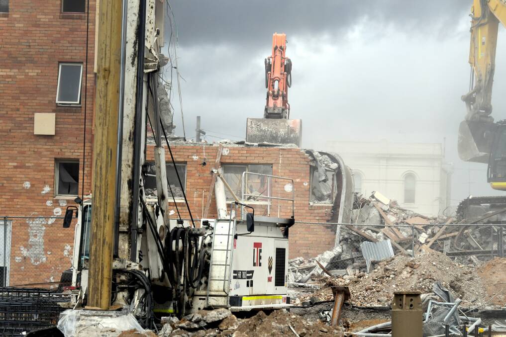 Civic Hall's lower hall is partially demolished on Saturday. Picture: Lachlan Bence