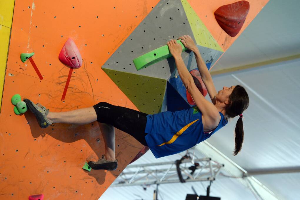Such great heights: Amanda Sullivan shows off her strength during the Australian Boulder Climbing Championships held in Ballarat in 2015. Picture: Kate Healy