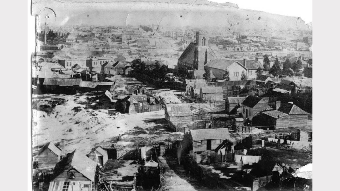 Old view: St Paul's Church of England and rough wooden houses, looking west up Sturt Street. Picture: The Ballarat Historical Society