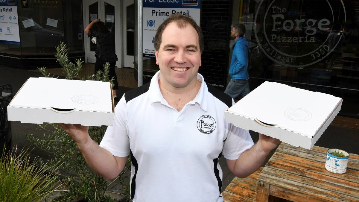Door to door: The Forge Pizzeria's Tim Matthews is on board with Uber Eats, which will launch in Ballarat from Wednesday. Picture: Lachlan Bence