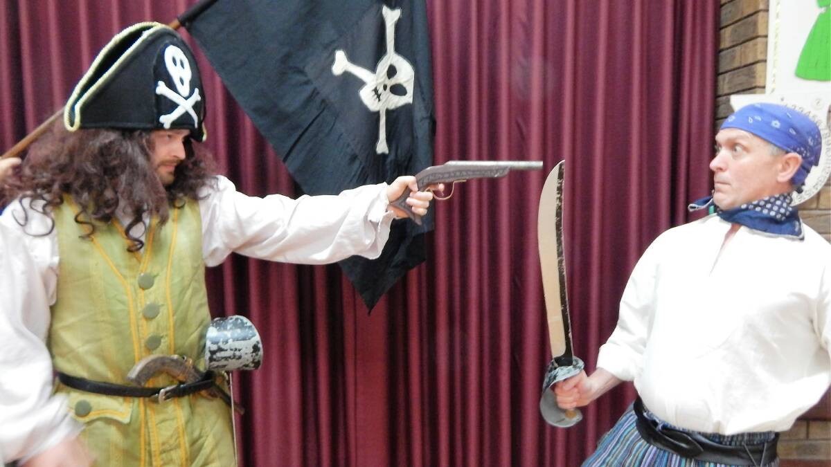 Sword play: Members of Cordelia’s Potted Operas prepare their swashbuckling for performances of The Pirates of Penzance on Sunday. 