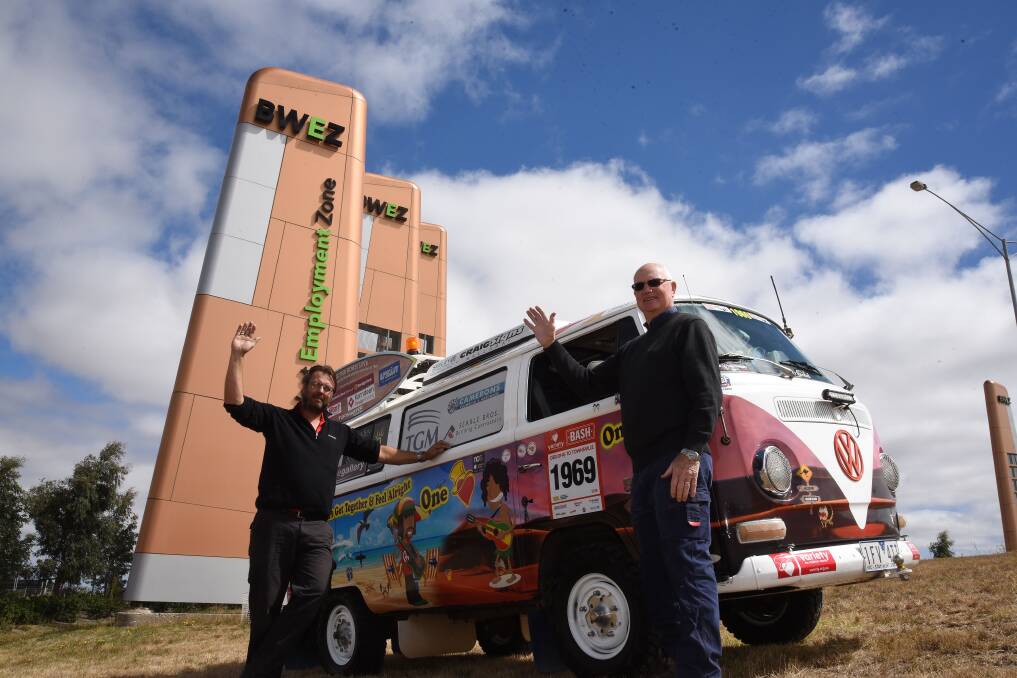 GIANT EVENT: Wayne Squire and Lindsay Florence at the entrance of the airport a week out from the 2019 Swap Meet. Picture: Alan Marini