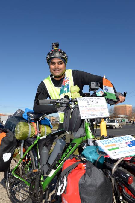 RIDE: Abhishek Kumar Sharma adds Ballarat to the 1,043 cities he has passed through during his ride around the world. Picture: Kate Healy. 