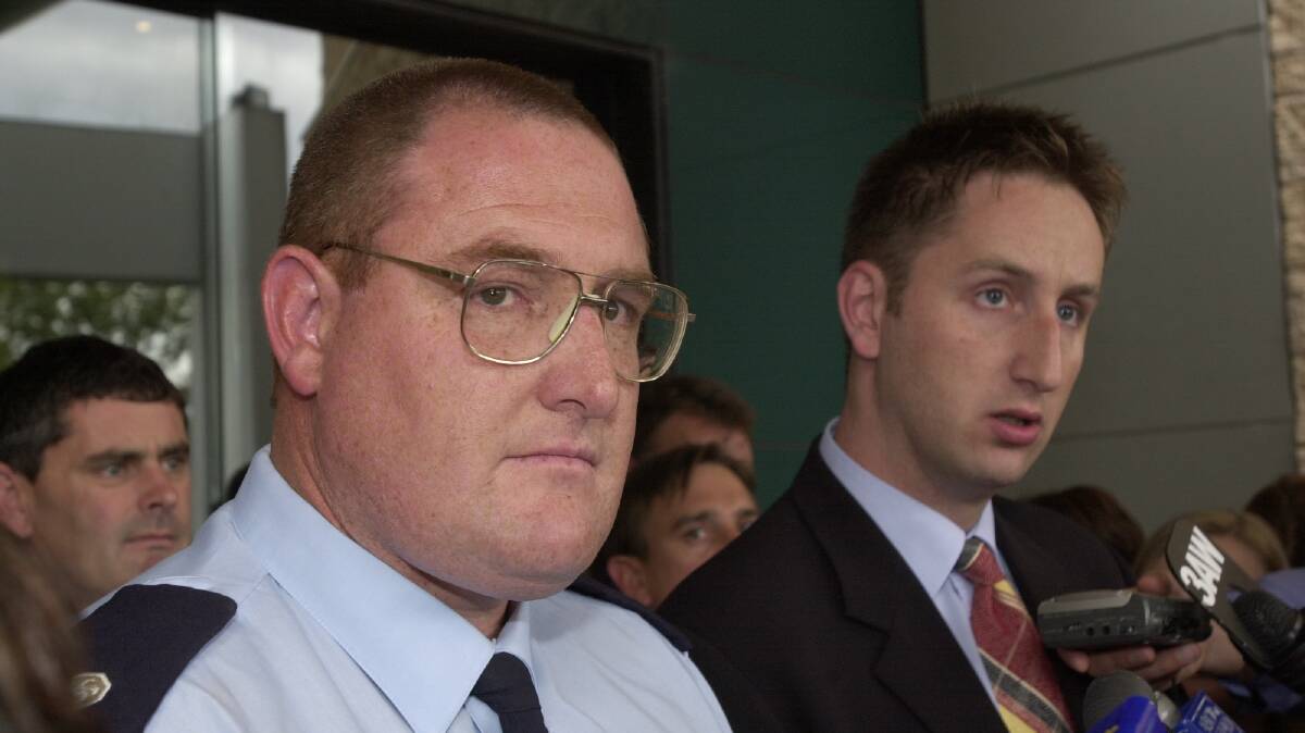 LEADER: Senior station officer Simon Scharf (left) at the Geelong Courts during the 2002 Linton bushfire inquest. 