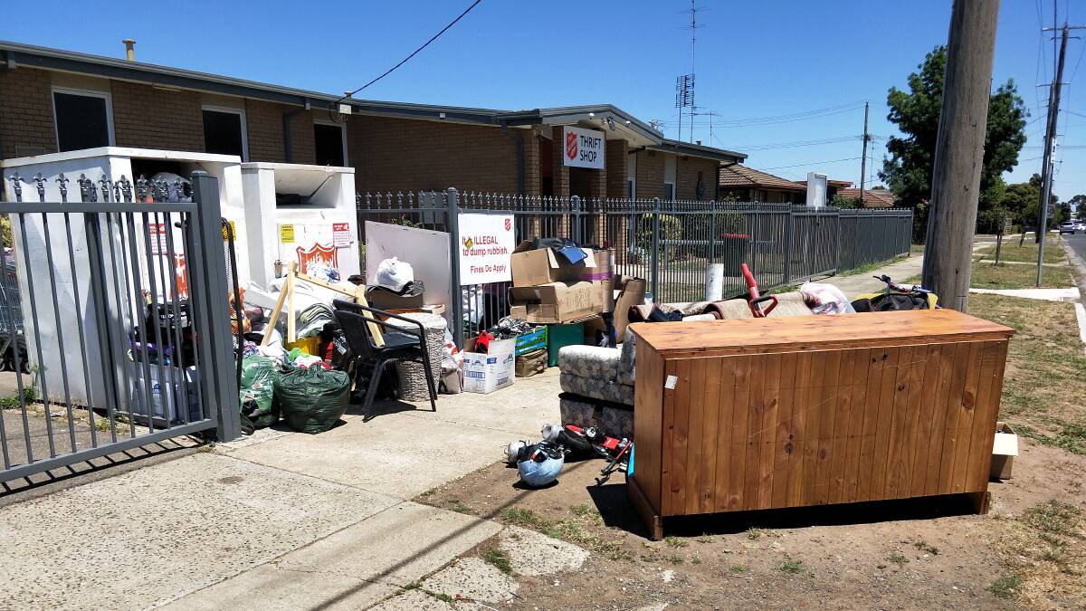 GARBAGE: Staff members at the Norman Street Thrift Shop are at their wits end with the amount of rubbish being dumped outside of the business.