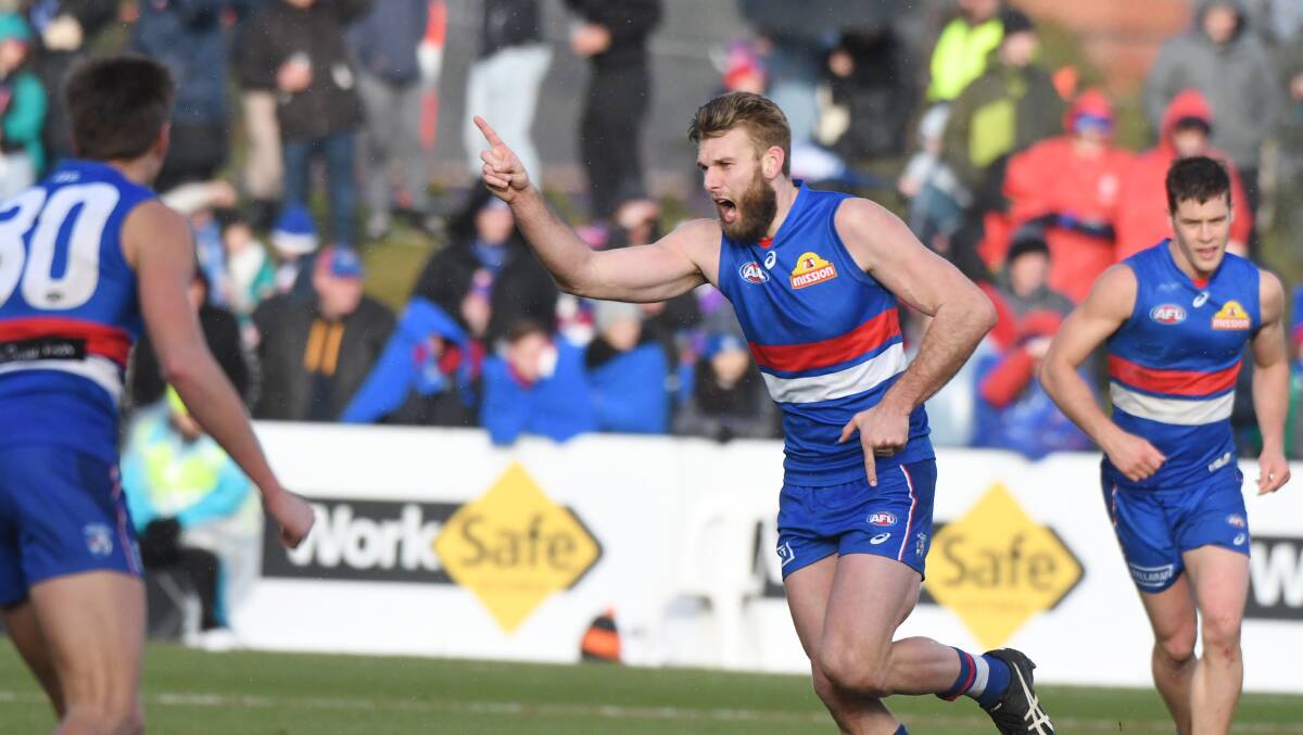 CELEBRATE: Jackson Trengove celebrates one of his two goals at Mars Stadium during last years clash with Port Adelaide. Picture: Kate Healy.