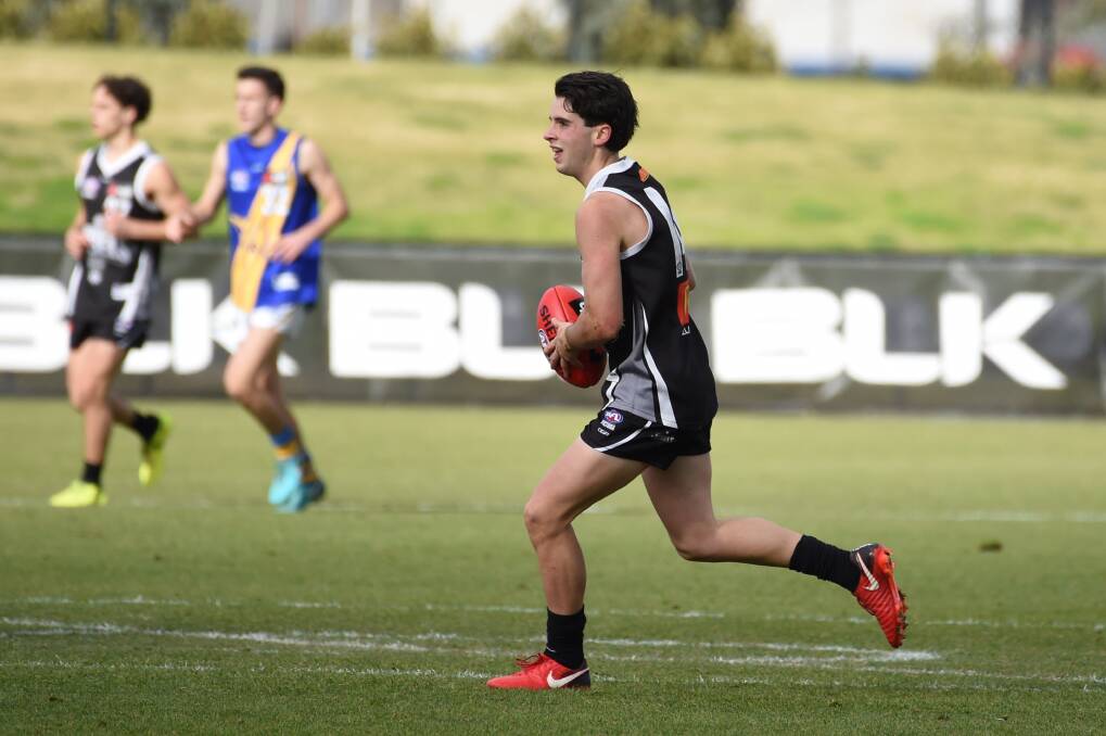 BALL USE: Liam Herbert tallied 28 disposals and a goal in the loss. Picture: Kate Healy